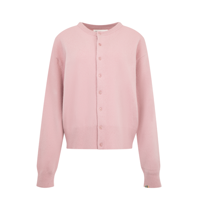 Image 1 of 2 - PINK - Extreme Cashmere Women's Luce Cardigan is crafted from cashmere and features a classic crew neckline, eight corozo button closures, and a comfort fit with dropped shoulders. Designed with a relaxed silhouette, this knit is finished with ribbed cuffs, hem, and neckline for added structure. Main Material: 88% Cashmere, 10% Nylon, 2% Elastane.