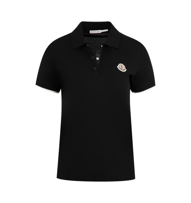 Image 1 of 2 - BLACK - MONCLER Polo Shirt featuring straight fit, polo collar with short press stud placket, ribbed knit details with contrasting stripe on sleeve and logo patch. 100% cotton.