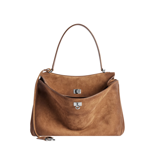 Image 1 of 4 - BROWN - BALENCIAGA Rodeo Handbag Medium in waxed suede calfskin and smooth calfskin featuring one handle, removable shoulder strap, removable cloche cls with two split rings, aged-silver hardware, turn lock closure, wide front pocket, 1 main compartment, 1 inner zipped pocket, 2 flat pockets at back, side snaps, 4 brass feet and nappa lambskin lining. L13.8 x H9.2 x W4.3 inch. Calfskin. Made in Italy.