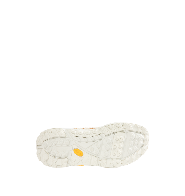 Image 4 of 5 - WHITE - HOKA Tor Summit+ Pony Hair Sneaker featuring pony hair leather upper, metal eyelets + hiking-style lacing system, Vibram Megagrip outsole for traction on varied terrain, cushioned midsole for long-wear comfort, pull tabs at heel and tongue for easy entry and ;ow-cut hiking silhouette.