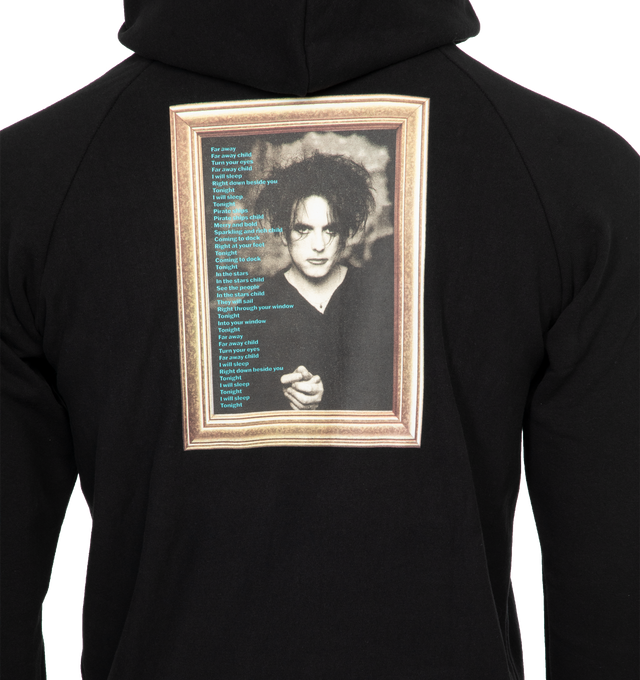 Image 4 of 4 - BLACK - NOAH X THE CURE Raglan Hoodie featuring raglan sleeves, printed graphics on front and back and embroidered Noah logo on front pouch pocket. 100% cotton. Made in Canada. 