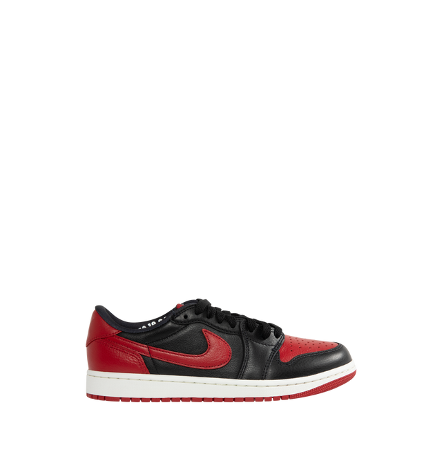 Image 1 of 5 - MULTI - Men's Air Jordan 1 Retro Low OG Sneakers feature a smooth leather upper with the iconic low-top silhouette and signature X graphics on the heel, honoring one of the most legendary colorways in Jordan history. These lifestyle sneakers combine encapsulated Air-Sole cushioning, a responsive foam midsole, and a durable rubber outsole for lightweight comfort, lasting support, and reliable everyday traction. Main Material: Leather. Midsole: Foam with Encapsulated Air-Sole Unit. Sole: Rubber