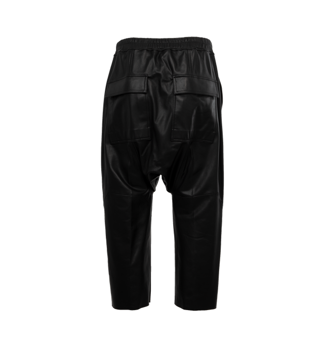 Image 2 of 4 - BLACK - RICK OWENS Cropped Leather Pants featuring paneled construction, drawstring at elasticized waistband, four-pocket styling, button-fly, creased legs, gusset at inseam, full cupro satin lining and horn hardware. 100% lambskin. Lining: 100% cupro. Made in Moldova. 