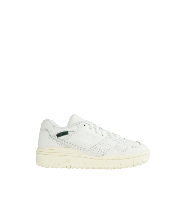 Image 1 of 5 - WHITE - NEW BALANCE 550 Mini Logo Sneaker featuring a debossed NB logo, premium white leather, green tag on the lateral ankle and rubber sole.  