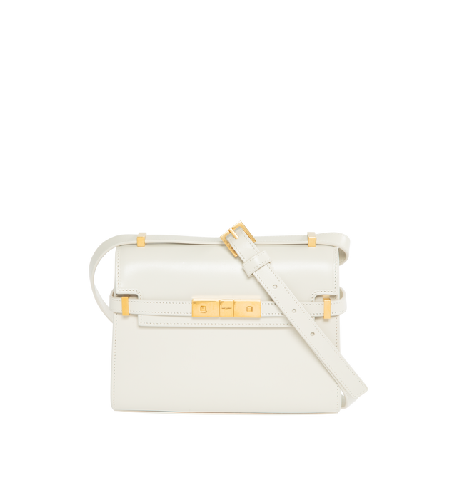 Image 1 of 3 - WHITE - Saint Laurent Mini Manhattan Cross-body box bag with a small flap on top with magnetic clip buckle compression closure, compression tabs on the sides, featuring an adjustable shoulder strap. Calfskin leather with bronze-tone metal hardware. Interior features leather lining, one main compartment with one card slot. Measures  7.4 X 5.5 X 1.5 inches. Made in Italy.  