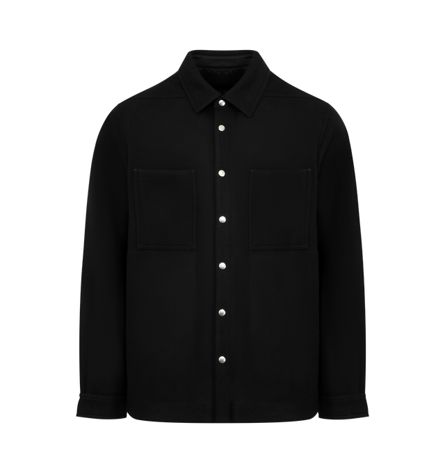 Image 1 of 2 - BLACK - RICK OWENS Overshirt featuring spread collar, button closure, flap pockets, droptail hem, beveled side seams, saddle shoulders, adjustable button fastening at cuffs, integrated logo-woven strap at interior and silver-tone hardware. Made in Italy.