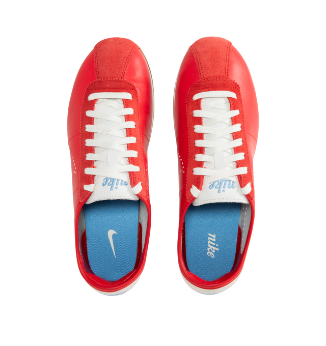 Image 5 of 5 - RED - NIKE Cortez Sneaker featuring leather upper with suede trim and rubber gum sole, lace-up front, embroidered Nike logo on tongue, perforated signature swoosh at sides and embroidered logo at back counter.