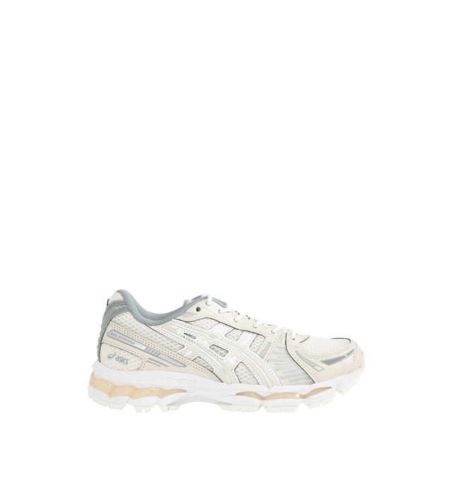 Image 1 of 5 - NEUTRAL - ASICS Gel-Kayano 12.1 Sneaker featuring breathable mesh underlays, GEL-NIMBUS17 tooling system, FLUIDRIDE technology, rearfoot and forefoot GEL technology and dope dyed recycled sockliner mesh. Imported from Vietnam.