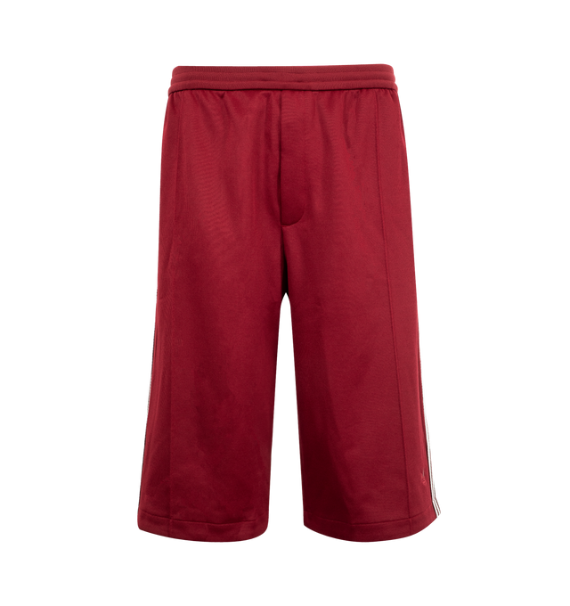 Image 1 of 3 - RED - Adidas x Wales Bonner Track Shorts featuring loose fit, drawcord on elastic waist and side zip pockets. 61% polyester, 39% cotton.