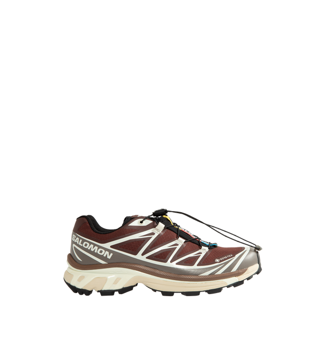 Image 1 of 5 - RED - Salomon XT-6 GORE-TEX Sneakers are crafted from synthetic and textile materials and feature the iconic XT-6 silhouette updated with waterproof GORE-TEX protection for all-weather performance. Originally developed as a high-performance trail running shoe, this modern iteration combines the model's signature comfort, cushioning, and stability with upgraded materials and fresh colorways designed for everyday urban wear. Main Material: Synthetic and Textile Upper. Lining: Textile. Insole: T