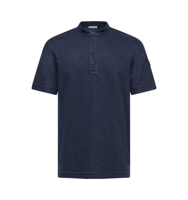 Image 1 of 2 - NAVY - MONCLER Polo Shirt featuring a cotton, linen and viscose blend, collar, short sleeves, snap button closure and double leather logo patch. 52% cotton, 24% flax/linen, 22% viscose/rayon, 2% polyamide/nylon.