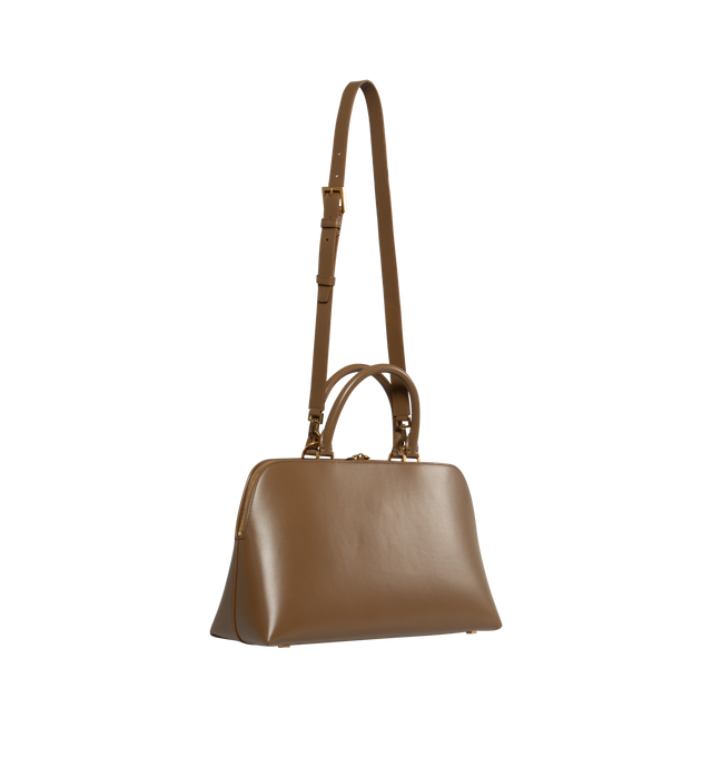 Image 2 of 4 - BROWN - SAINT LAURENT Sac De Jour Duffle featuring brass padlock, embossed logo, leather lining, two compartments separated by a zip pouch, top handle, adjustable shoulder strap and four metal feet. 14.4 X 8.7 X 0.4 inches. Calfskin leather. Made in Italy.  