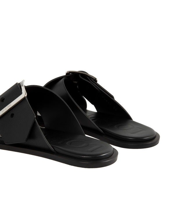 Image 2 of 4 - BLACK - Loewe Petal Belt flat sandal in vegetable-tanned calfskin featuring a criss-cross upper recalling a belt and the signature square buckle, 20mm Campo kitten heel, engraved LOEWE on the buckle, padded leather insole, and rubber island injected in the leather outsole for better grip. Made in Italy.
