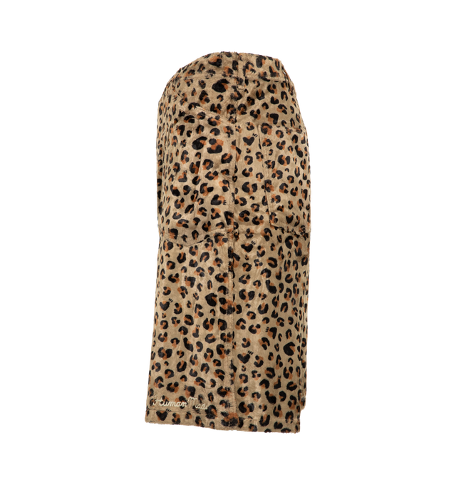 Image 3 of 4 - NEUTRAL - Human Made Men's Leopard Shorts are crafted from a cotton-rayon blend with a smooth pile texture and feature a wide, relaxed-fit silhouette inspired by rock-and-roll style. Designed with a vintage-washed finish, these statement shorts are detailed with a chain-stitched Human Made logo at the front hem, a brand message at the back pocket, and a convenient side pocket sized to fit an iPhone. Main Material: Cotton/Rayon Blend. Fit: Wide, Relaxed. Pockets: Side Pocket, Back Pocket. Deta