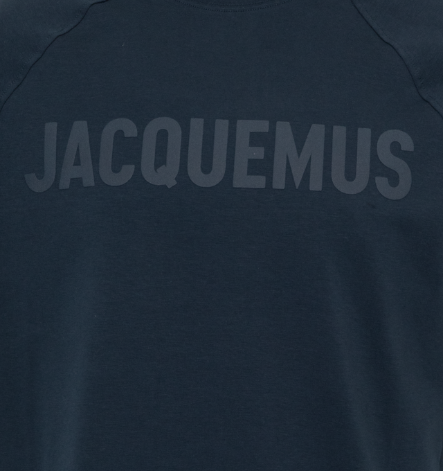 Image 2 of 2 - NAVY - JACQUEMUS LE TSHIRT TYPO is a raglan logo t-shirt with a relaxed fit, partially ribbed crew neck, elbow-length raglan sleeves and logo on the chest. 90% cotton. 10% elastane. 