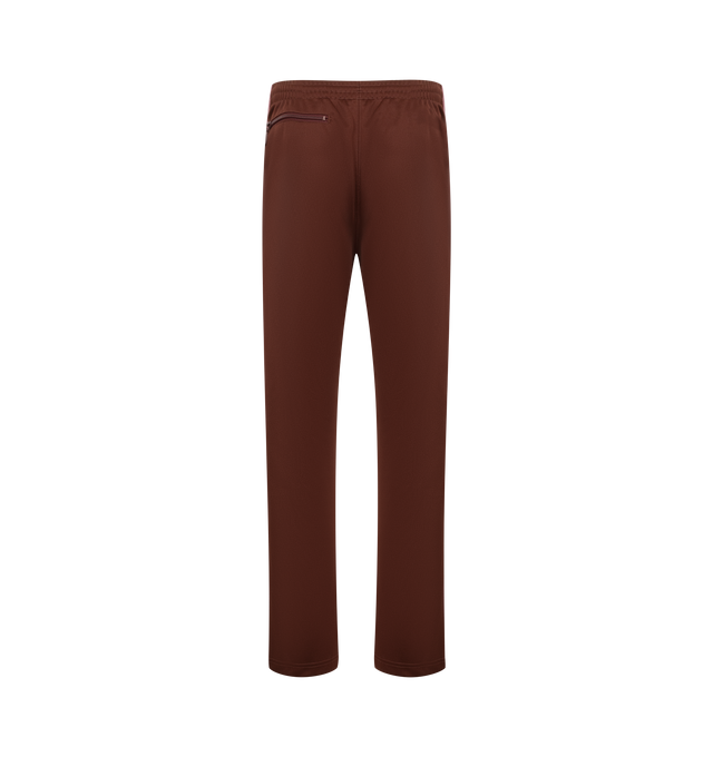 Image 2 of 3 - BROWN - NEEDLES Track Pant featuring signature design details, striped trims, an embroidered butterfly logo, elastic waist with drawstring and zipped pockets. 100% polyester. Made in Japan.