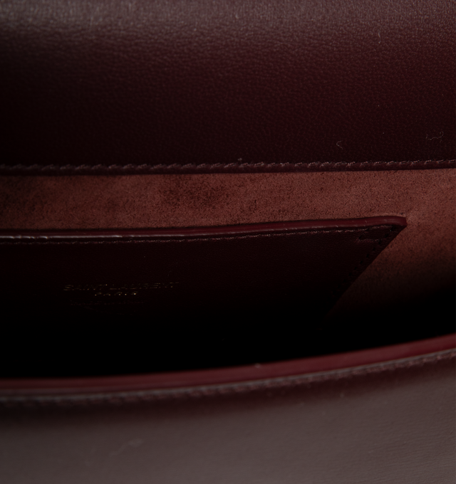 Image 3 of 3 - RED - SAINT LAURENT Solferino Medium Bag in box leather with a cassandre closure, fully lined in leather, rounded lines, adjustable strap for shoulder wear, suede lining, bronze-toned hardware and sliding clasp closure. 9.6" x 5.9" x 3.3". Strap drop: 8". Lambskin. Made in Italy.
