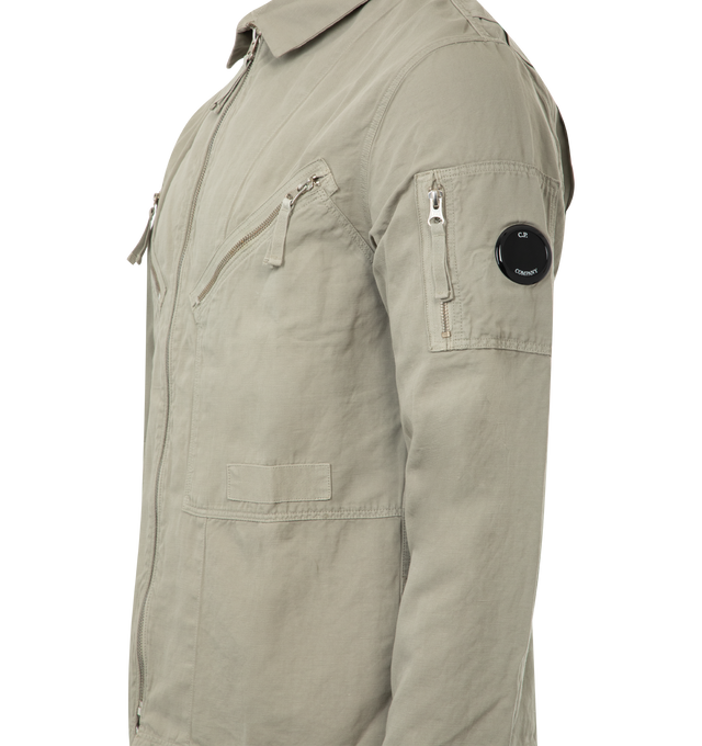 Image 3 of 3 - GREEN - C.P. COMPANY Full Zip Overshirt crafted in garment dyed armatured cotton/linen, lens detail, regular fit, classic collar, full zip fastening, chest zip pockets, sleeve zip pocket, lens detail and adjustable button cuffs. 51% cotton, 49% flax/linen.