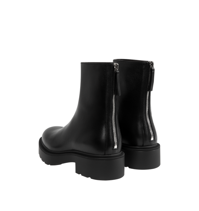 Image 2 of 4 - BLACK - THE ROW Nobilis Fast Boot featuring versatile ankle boot in polished calfskin leather with round toe, back zipper closure and treaded rubber platform sole. 100% calfskin leather. Synthetic sole. Made in Italy.