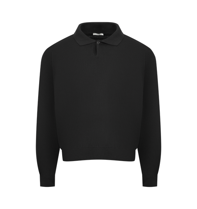 Image 1 of 2 - BLACK - THE ROW Kirin Polo featuring long-sleeved polo top in lightweight organic cotton jersey with boxy fit, single horn button closure, and ribbed collar, cuffs, and hem. 100% cotton. Made in Italy.