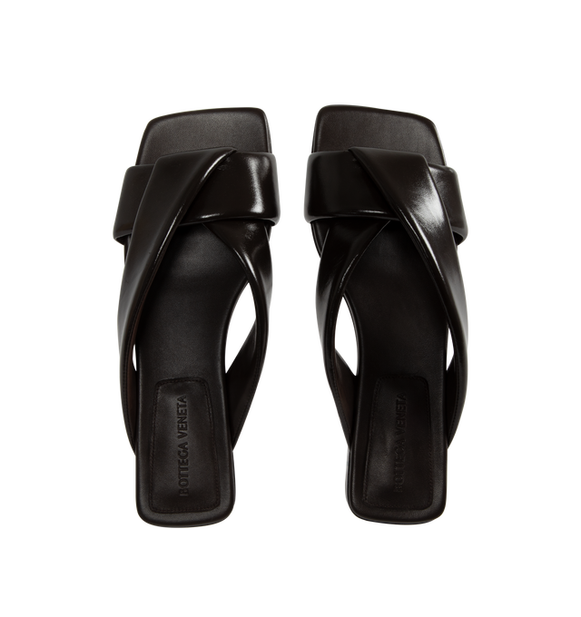 Image 4 of 4 - BLACK - BOTTEGA VENETA Riva Flat Mule featuring shiny calfskin with padded tubular straps and twisted design. Calfskin. Lining: lambskin. Made in Italy.