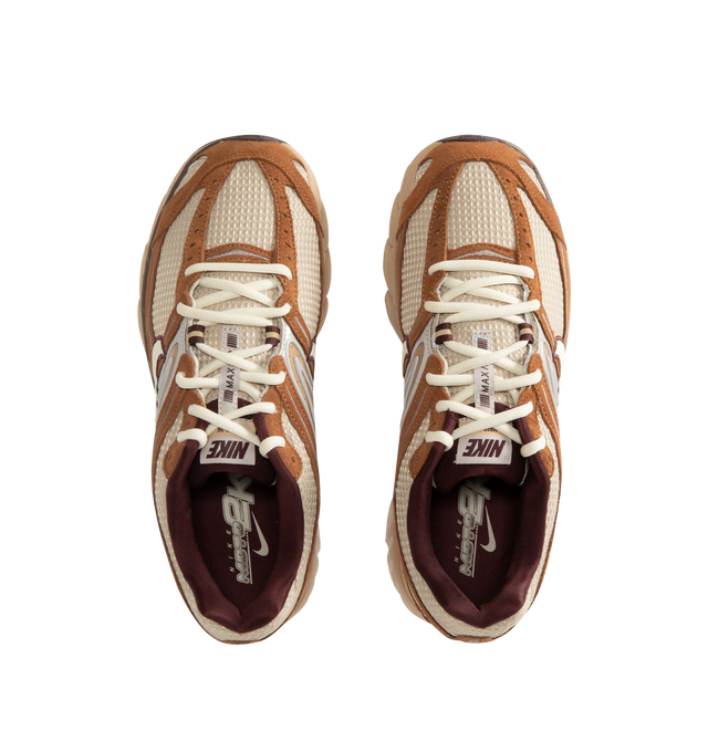 Image 5 of 5 - NEUTRAL - Nike Mens Air Max Moto 2K Sneakers feature a textile and synthetic leather upper. Designed with a lace-up closure, Max Air cushioning, foam midsole, and durable rubber outsole. Upper: Textile and Synthetic Leather; Midsole: Foam with Max Air Cushioning; Outsole: Rubber. Made in Vietnam.