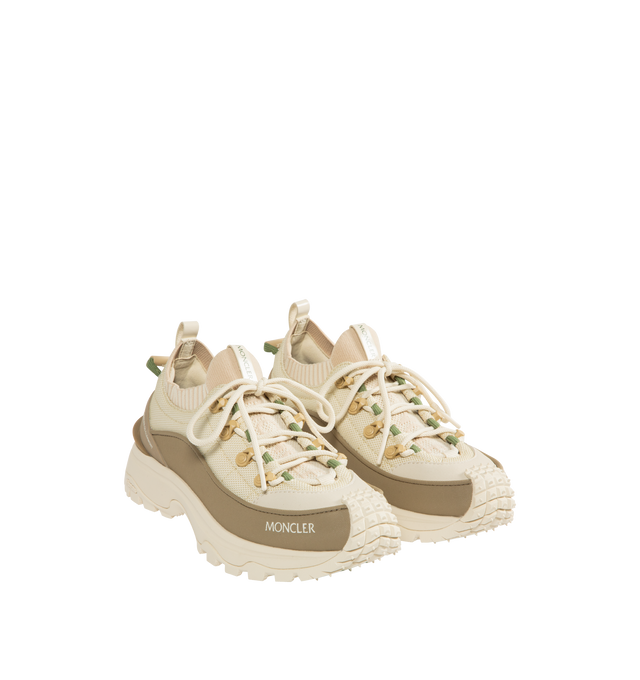 Image 2 of 5 - NEUTRAL - MONCLER Trailgrip Lite3 Sneakers featuring knit fabric, nylon fabric and textured PU upper, elastic fabric and mesh insole, lace-up, carbon sole, TPU spoiler, EVA midsole, special Vibram MEGAGRIP rubber compound tread and OrthoLite insole. 100% polyester. Lining: 100% polyamide/nylon. Sole: 100% elastodiene.