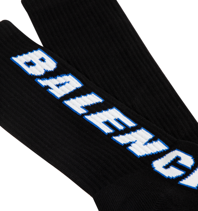 Image 2 of 2 - BLACK - BALENCIAGA Tilted Typo Socks in cotton blend featuring high socks, breathable fabric, tilted typo artwork jacquard and finishes in ribs. 71% cotton, 26% polyamide, 3% elastane. Made in Portugal.