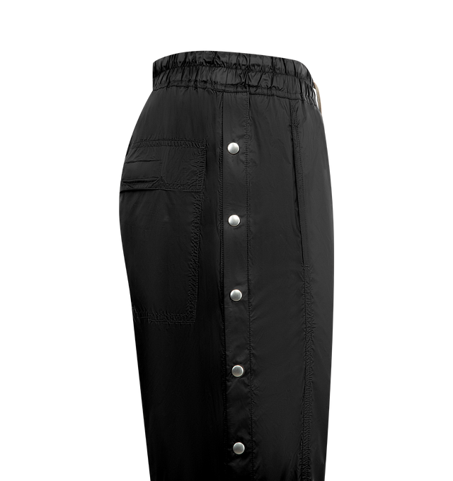 Image 3 of 3 - BLACK - DRKSHDW Pusher Pants featuring elastic waistband with drawstring, back flap pockets and side buttons detail down the leg. 100% nylon. Made in Italy.