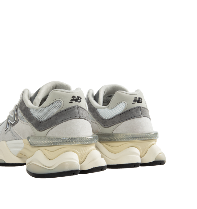 Image 3 of 5 - GREY - New Balance 9060 Unisex lifestyle sneaker with pig suede and mesh upper featuring ABZORB midsole to absorb impact, ABZORB SBS heel cushioning for additional stability and comfort, tongue logo inspired by original 991 lace jewel, translucent CR device at heel, and diamond outsole pattern inspired by classic 860 design.