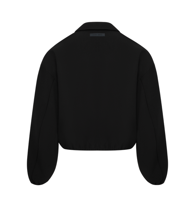 Image 2 of 3 - BLACK - FEAR OF GOD ESSENTIALS Bonded Canvas Jacket made from a bonded stretch fabric featuring a boxy, cropped fit with a shirt collar, full front zipper, and chest pocket with zip closure. Additionally, the Fear of God Essentials label is stitched at the back of the collar. 94% polyester, 6% spandex.