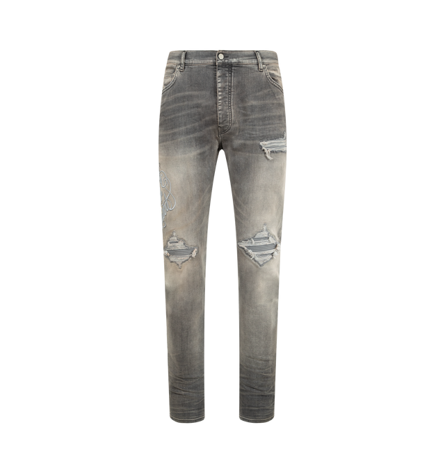 Image 1 of 3 - GREY - AMIRI Hollywood MX1 Jeans featuring used-effect stonewashed stretch cotton denim jeans with exposed ribbed suede repair, logo embroidery on the right leg, front button closure, five pockets and suede logo tag. 92% cotton, 6% elastomultiester, 2% elastane. Made in Italy.