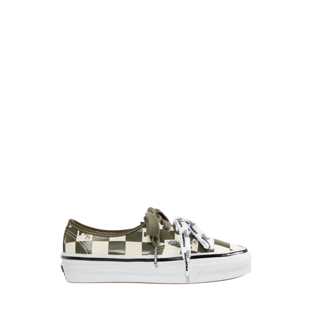 Image 1 of 5 - GREEN - VANS X HOMME GIRLS OTW Authentic 44 Sneaker featuring Heritage low-top shoe, Style 44, 8 oz canvas upper with 6 oz canvas bindings and heel strip, HommeGirls branded lace, with optional second lace, metal eyelets, higher sidewall with gloss finish, foxing tape, reinforced outsoles, Co-branded Foam ADC (All-Day Comfort) insole, signature waffle outsole pattern, all-over checkerboard pattern with Hg monograms and co-branded logo heel scab.