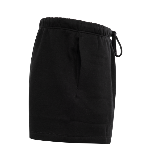 Image 3 of 3 - BLACK - FEAR OF GOD ESSENTIALS Running Short featuring cropped length, an encased elastic waistband with elongated drawstrings, side seam pockets and a rubberized label at the center front. 80% cotton, 20% polyester.  