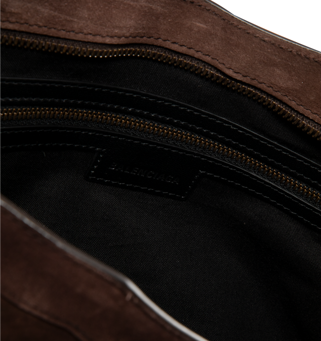 Image 3 of 3 - BROWN - BALENCIAGA Le City Bag Medium featuring waxed suede calfskin, two hand-braided handles, adjustable and removable shoulder strap, brass hardware, zipped closure with knotted leather puller, front zipped pocket with knotted leather puller, 1 inner zipped pocket and cotton canvas lining. 15.1" x 9.4" x 5.3". Handle drop: 6.1". Strap drop: 14.2". Calfskin, cotton. Made in Italy.