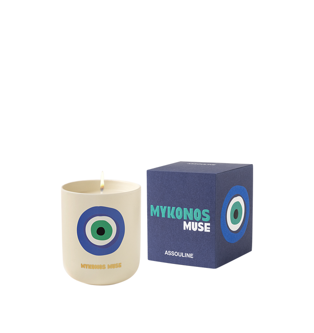 Image 1 of 5 - MULTI - Assouline Mykonos Muse - Travel From Home Candle. Bathe in the idyllic shores of Mykonos with the aroma of fresh green fig, warm tonka, sweet almond, and herbaceous cyclamen, as this exquisite blend evokes the allure of hidden coves and charming whitewashed villas. Material: Ceramic Vessel. Wax Family: Soy, Coco, Paraffin Blend. Approximate Burn Time: 50 Hours. Weight: 11.25 oz (318.02 g). Dimensions: 4 x 3.37 in (10.16 x 8.56 cm).