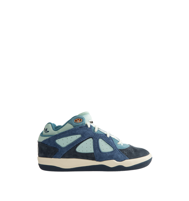 Image 1 of 5 - BLUE - Adidas Originals x Bad Bunny Men's BADBO 1.0 Unisex Shoes feature a bold, contemporary silhouette that reflects the latest collaboration between adidas Originals and Bad Bunny. Designed with premium materials and distinctive detailing, this statement sneaker blends sport-inspired functionality with the artist's signature creative vision, delivering a modern look rooted in self-expression and individuality. Upper: Nubuck with hairy suede overlaysOutsole: Rubber.