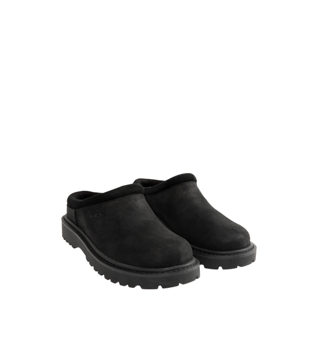 Image 2 of 4 - BLACK - UGG Men's Birch Clog II is crafted from premium suede and features a slip-on clog silhouette with a soft lining and cushioned footbed for exceptional everyday comfort. These designer clogs combine UGG's signature cozy feel with durable construction, making them a versatile choice for both indoor and outdoor wear. Main Material: Suede. Lining: Soft Textile. Sole: Rubber.