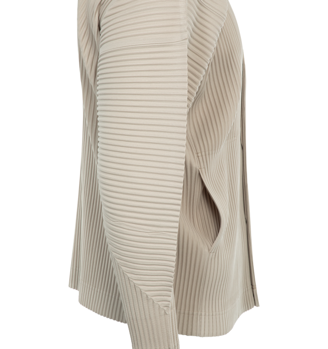 Image 3 of 3 - NEUTRAL - ISSEY MIYAKE Cardigan featuring garment-pleated polyester, V-neck, press-stud closure, seam pockets and dolman sleeves. 100% polyester. Made in Philippines. 
