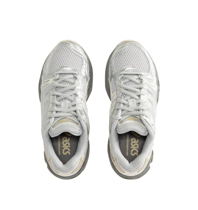 Image 5 of 5 - WHITE - Asics GEL-Kayano 14 Sneakers are lace-up style with rip-stop underlays, GEL cushioning, and TRUSSTIC support system. Unisex style in men's sizing.