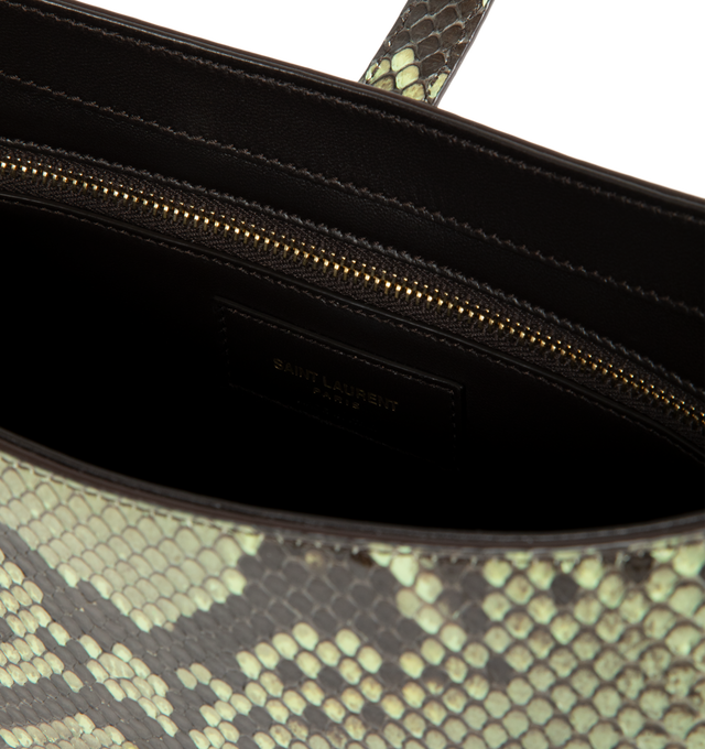 Image 3 of 3 - GREEN - Saint Laurent Le 5 7 leather shoulder bag featuring gold hardware, the 'Cassandre' logo detail, and suede lining. Compact and spacious, it features an interior zipped pocket and adjustable shoulder strap. Dimensions: 9 x 6.2 x 2.5 inches with 7.8 inch strap drop. Fits a large phone, card case, keys and other small essentials. Material: leather. Made in Italy.