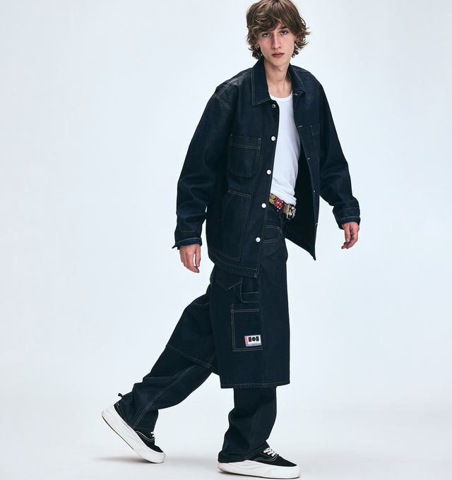 Image 8 of 9 - BLACK - NAHMIAS Ollie Sneaker featuring round rubber cap toe, lace up closure, textile logo patch at tongue, branded logo detail on outsole lip, padded tongue and collar, treaded logo outsole, rubber midsole, logo emboss on heel and logo gum bottom.