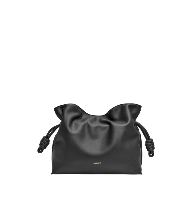 Image 1 of 4 - BLACK - LOEWE Medium Flamenco Clutch in nappa calfskin featuring a soft and slouchy bag with a cinched closure and historical knot drawstrings, shoulder, crossbody or hand carry, detachable and adjustable strap, discreet magnetic closure, suede lining and embossed Anagram. Nappa calf. 24.5 cm x 30 cm x 10.5 cm. Made in Spain.