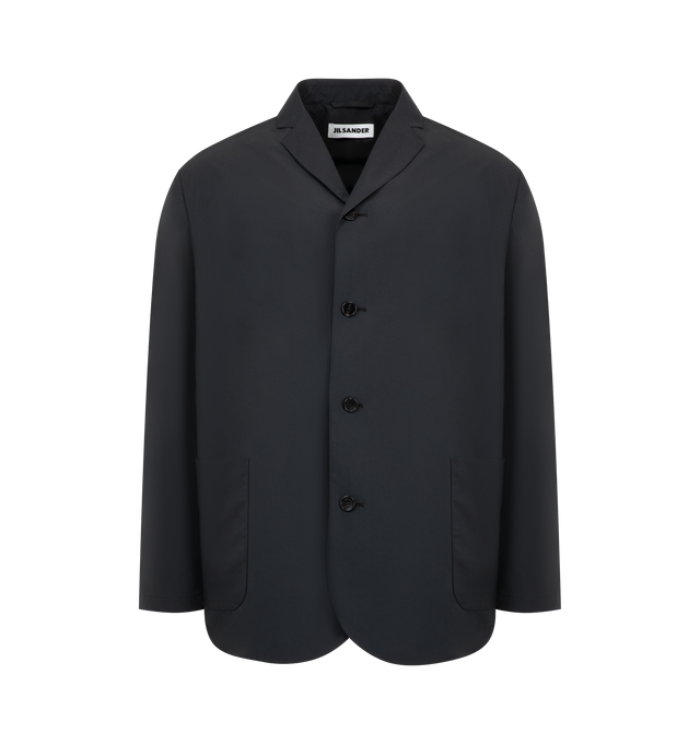 Image 1 of 3 - BLACK - Jil Sander Mens Sport Jacket is a Single-Breasted Tailored Jacket is crafted from lightweight technical fabric. Features a relaxed fit, notched lapels, button-front closure, long sleeves, two front patch pockets, and a straight hem. Main Material: 100% Polyester. Made in Italy.