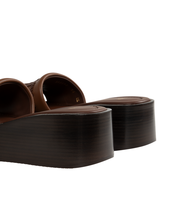 Image 3 of 4 - BROWN - FENDI Sunshine Platform Slide featuring wide-band, a platform sole and tone-on-tone leather threading that depicts the iconic FF motif. 100% calf leather. Made in Italy.