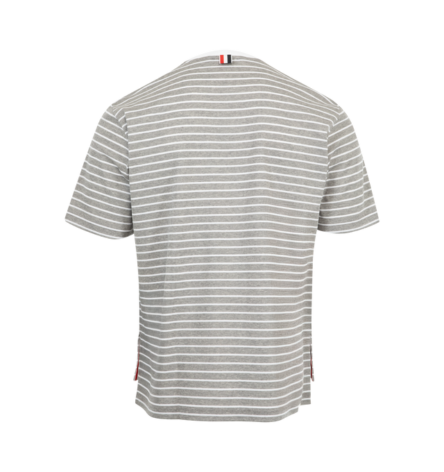Image 2 of 2 - GREY - THOM BROWNE Milano Pocket Tee featuring chest patch pocket, short sleeves, crewneck, stripes throughout, name tag applique, buttoned side vents with signature striped grosgrain trim, dropped back hem and signature striped grosgrain loop tab. 100% cotton. Made in Italy.