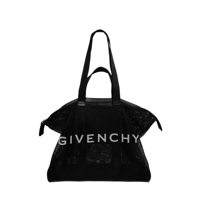 Image 1 of 3 - BLACK - GIVENCHY Large G-Shopper Tote Bag in Mesh featuring a zipper closure, G-Shopper line, two different lenghts of handles, GIVENCHY signature printed on the front and one main compartment and one inside flat pocket. 100% polyester. Secondary material: 100% calfskin leather. Lining: 100% polyamide. 19.7 in x 17.9 in x 6.7 in. Made in Italy. 