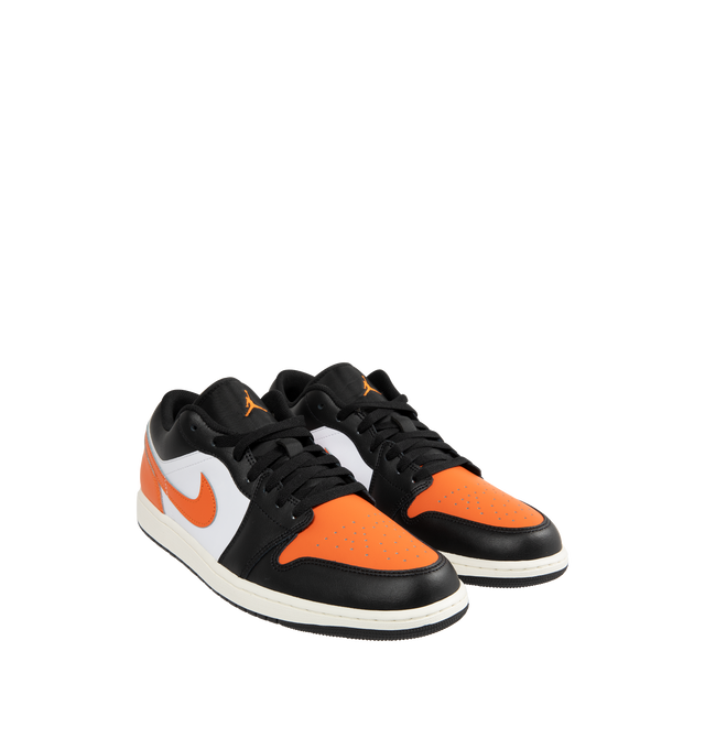 Image 2 of 5 - ORANGE - JORDAN Air Jordan 1 Low Sneaker featuring encapsulated Air-Sole unit provides lightweight cushioning, genuine leather in the upper and solid rubber outsole.