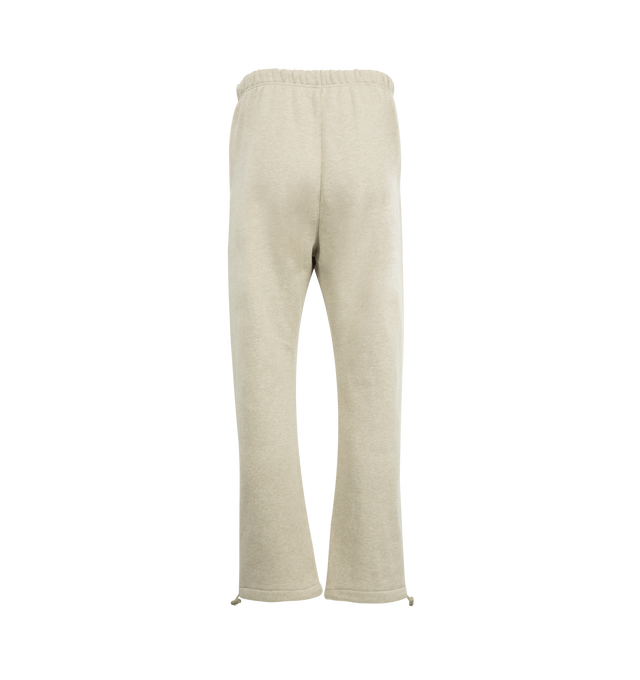 Image 2 of 3 - NEUTRAL - FEAR OF GOD Relaxed Fleece Sweatpant featuring side pockets, elastic waistband with drawstring, relaxed fit and logo details. 80% cotton, 20% polyester.