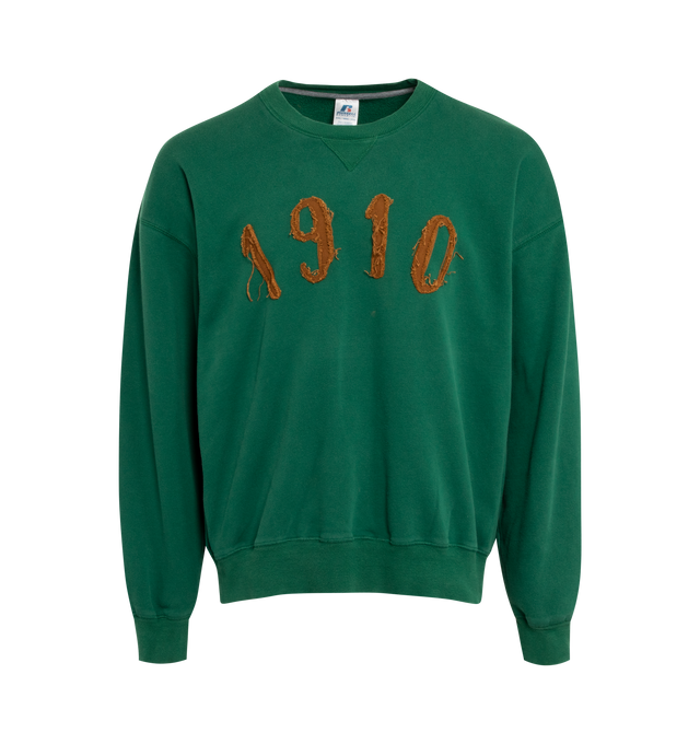 Image 1 of 4 - GREEN - This forest green upcycled vintage sweatshirt features "1910" applique at the front, Transnomadica label at the back.  80% cotton / 20% polyester. Measurements: 25 inches in length from neckline to front hem, 27 inches from shoulder-to-shoulder, 27 inches from armpit-to-armpit, 23 inches from top sleeve seam to top of wrist with size XXL on its original vintage label.This collection of vintage sweatshirts, exclusively for 1910 at Hirshleifers, each featuring a hand-crafted 1910 appl 